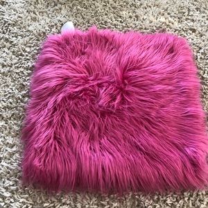 Pink furry pottery barn pillow